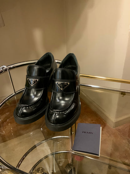 PRADA MONOLITH LEATHER LOAFERS