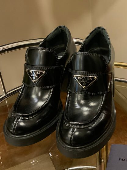 PRADA MONOLITH LEATHER LOAFERS