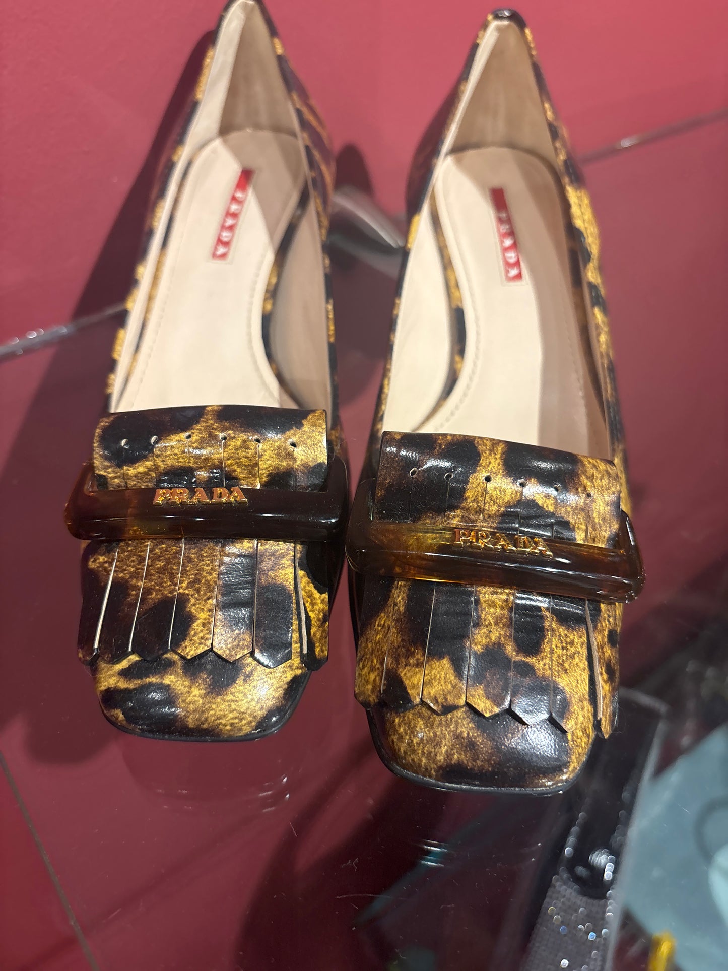 PRADA VINTAGE HEELED ANIMAL PRINT LOAFERS