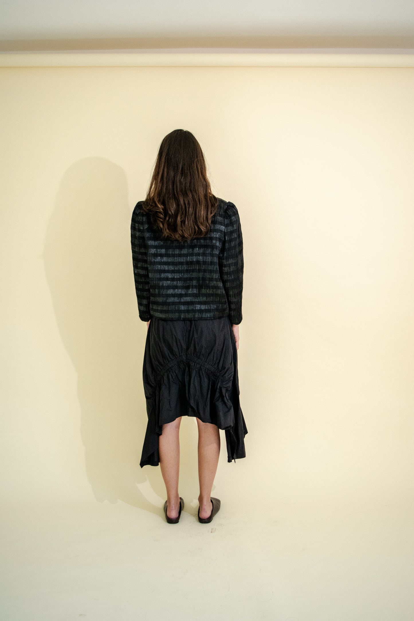 PLEATED JACKET WITH LINES