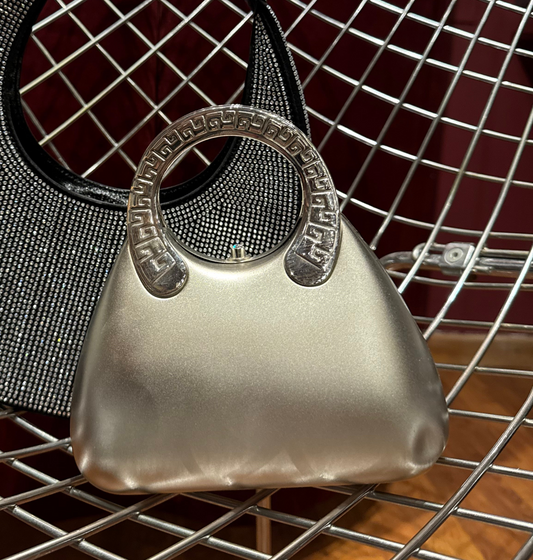 METALLIC CLUTCH WITH HANDLE