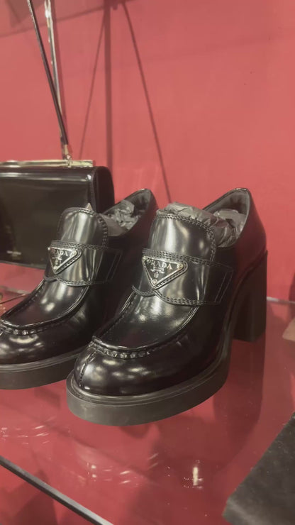 PRADA MONOLITH LEATHER LOAFERS